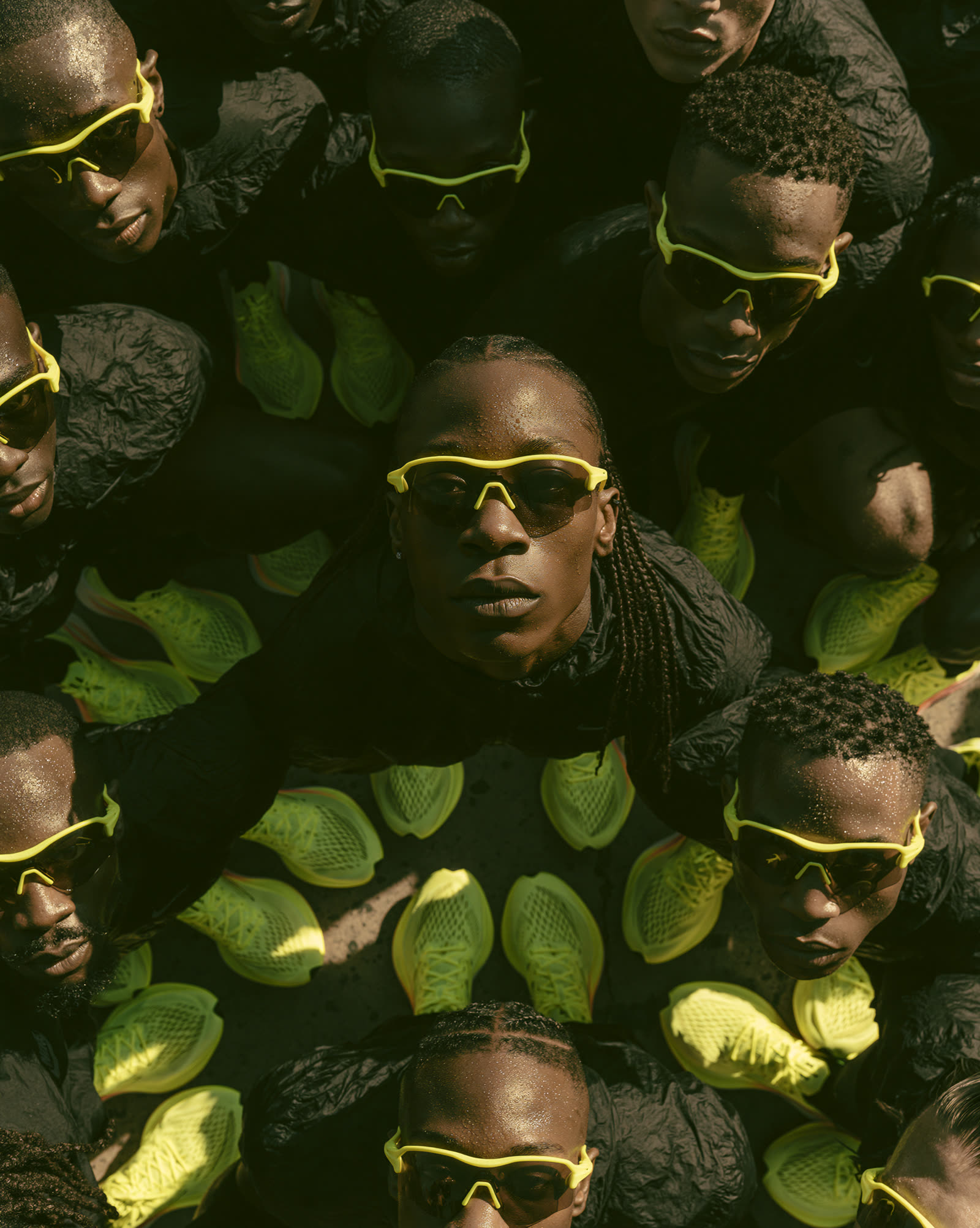 Fisheye crowd of runners in neon-yellow glasses