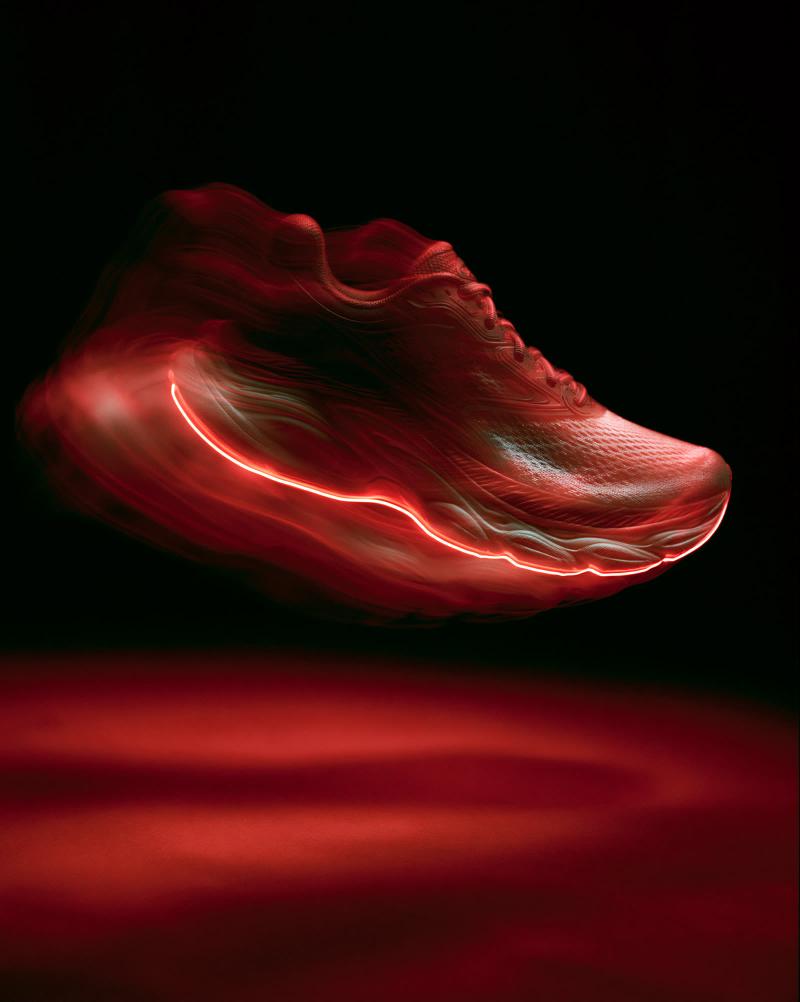 Red running shoe with motion blur on black